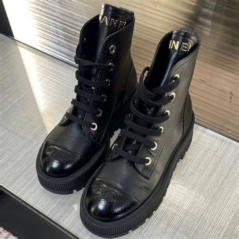 chanel black boots fall-winter 23/24|Chanel high heel boots.